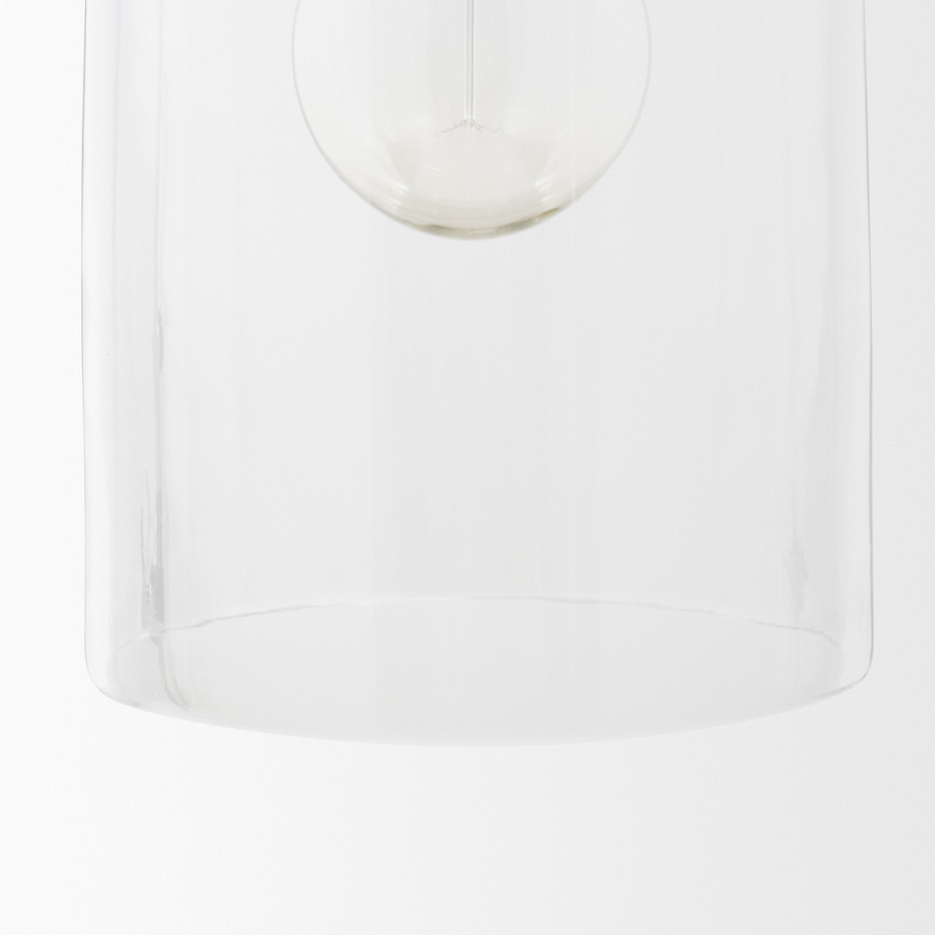 Sadah Tall Clear Blown Glass w/ Gold Metal Pendant Light shown from a different angle to reveal its silhouette.