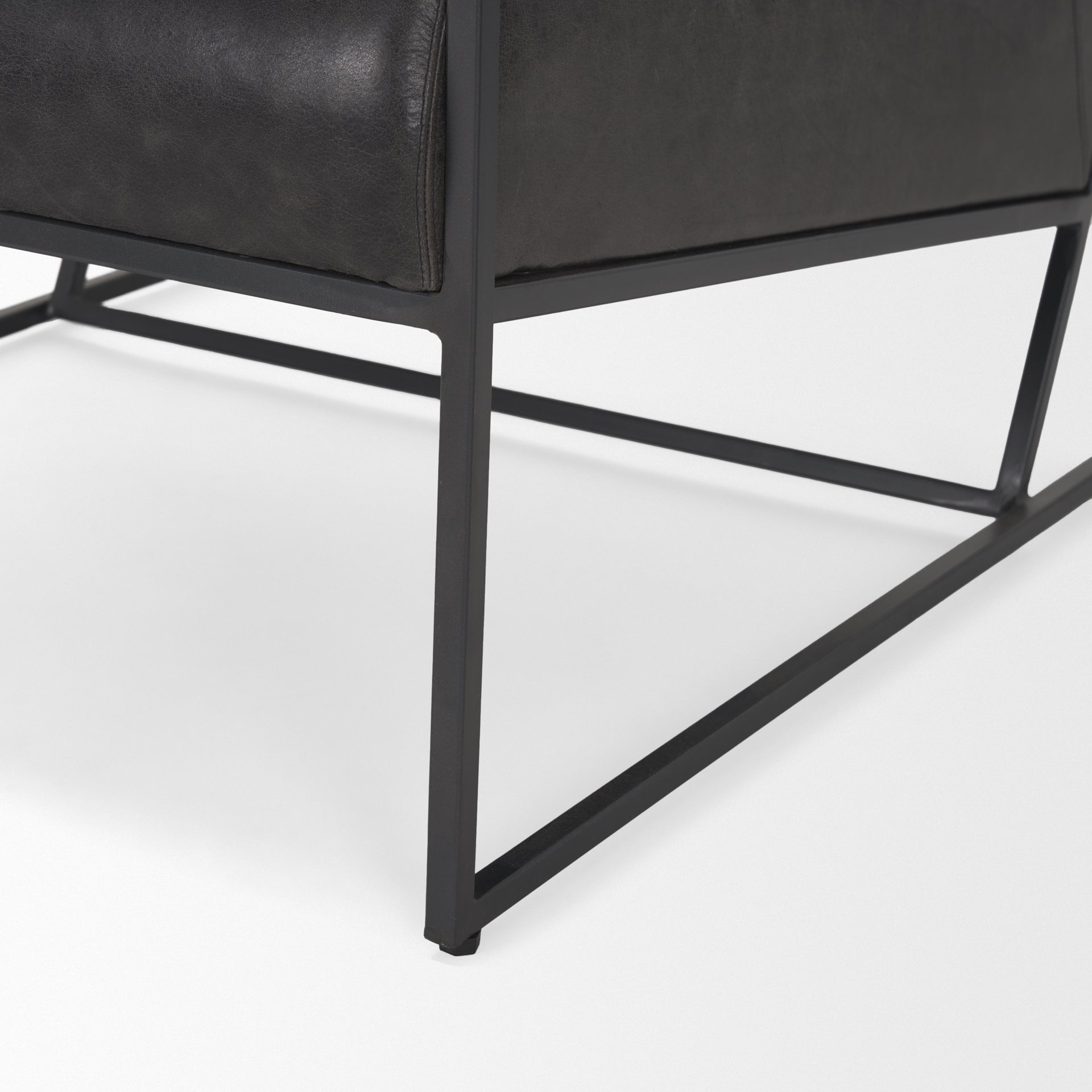 Stratton Gunmetal w/ Genuine Aged Black Leather Upholstered Accent Chair shown from another angle.