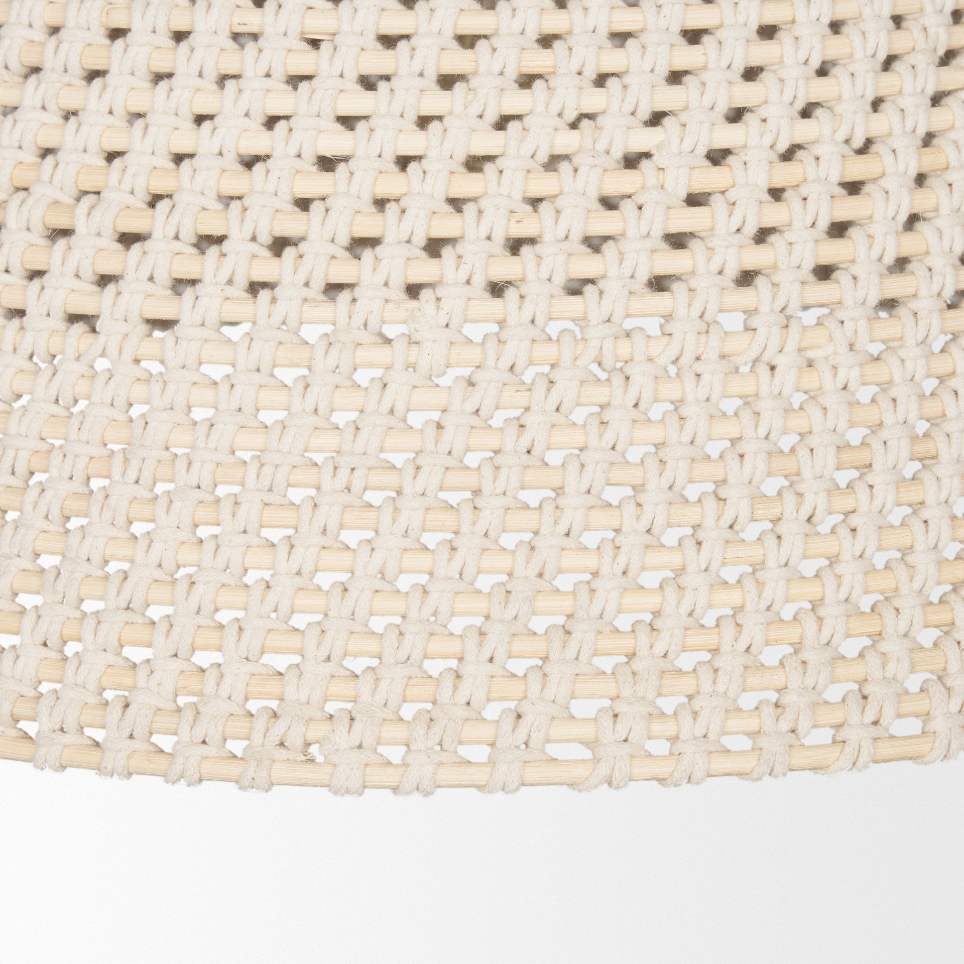 Tosha 1-Light Tapered Cotton Rope Drum Pendant shown from a different angle to reveal its silhouette.
