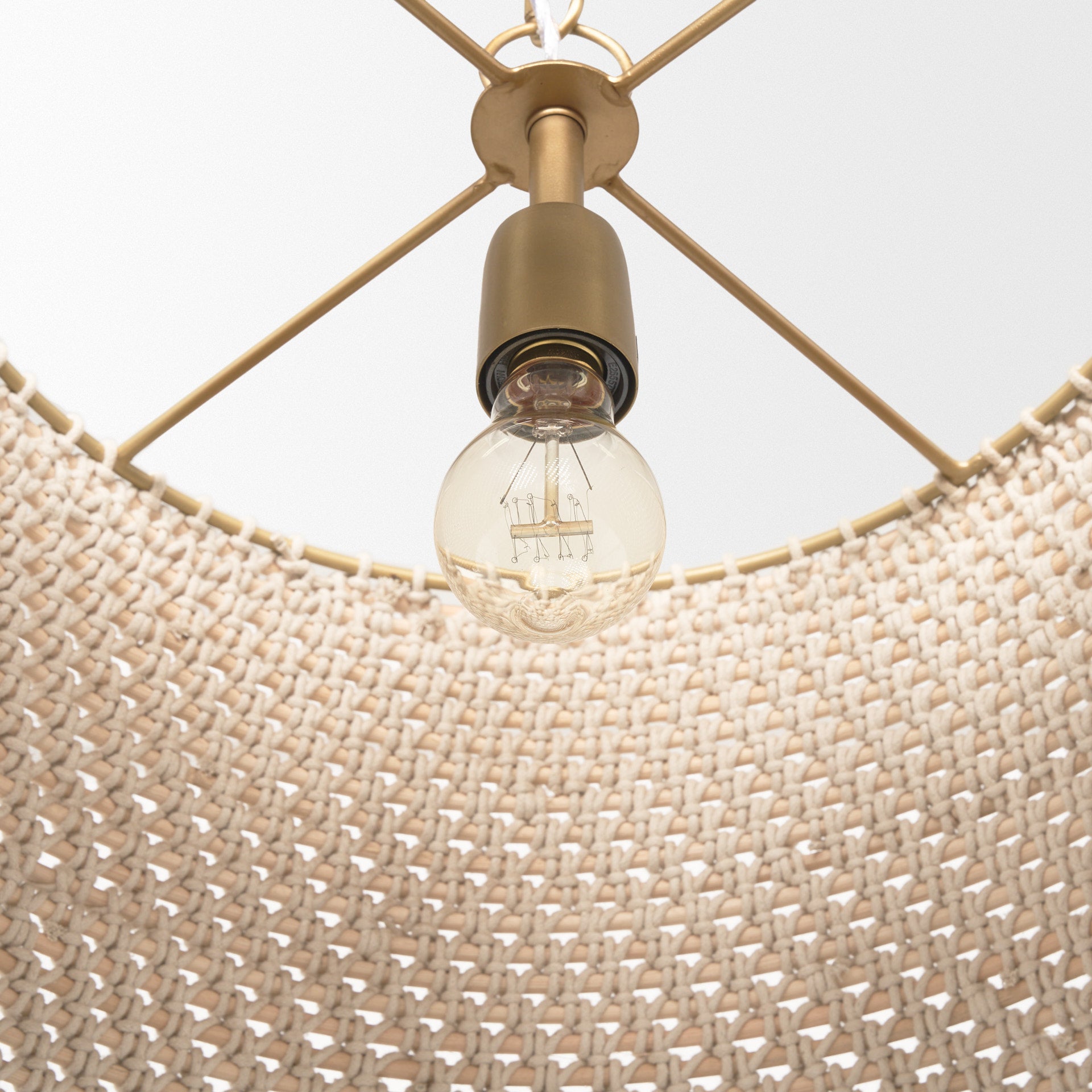 Profile view of the Tosha 1-Light Tapered Cotton Rope Drum Pendant.