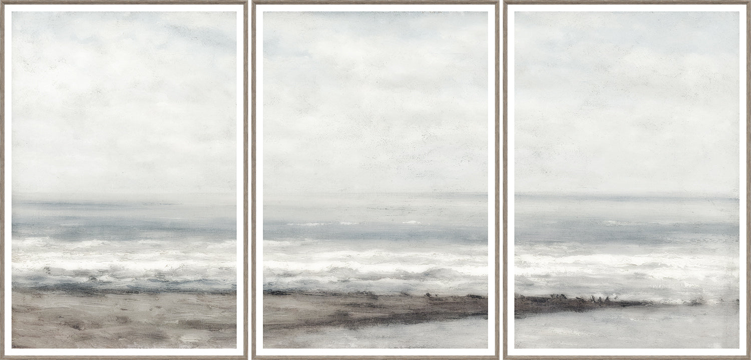 Seascape Near Heijst triptych wall art featuring soft gray and blue ocean waves under a cloudy sky.