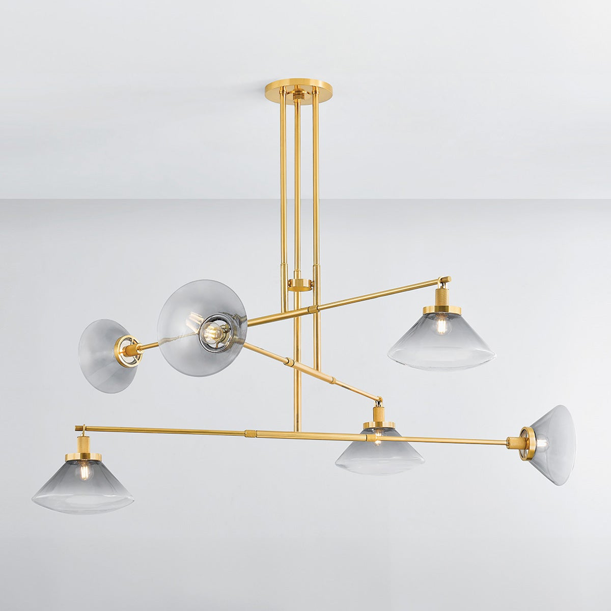 Mendon Chandelier in aged brass shown from the front to reveal the frame, arms, and shade detail.