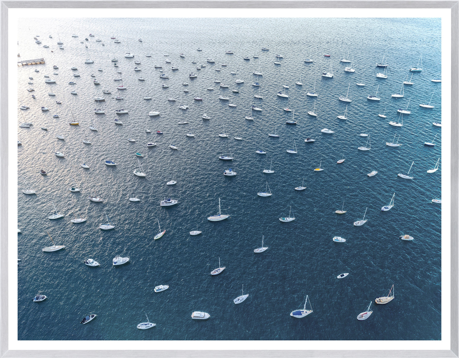 Cottage Point – Sydney wall art featuring numerous boats on blue water from an aerial view.