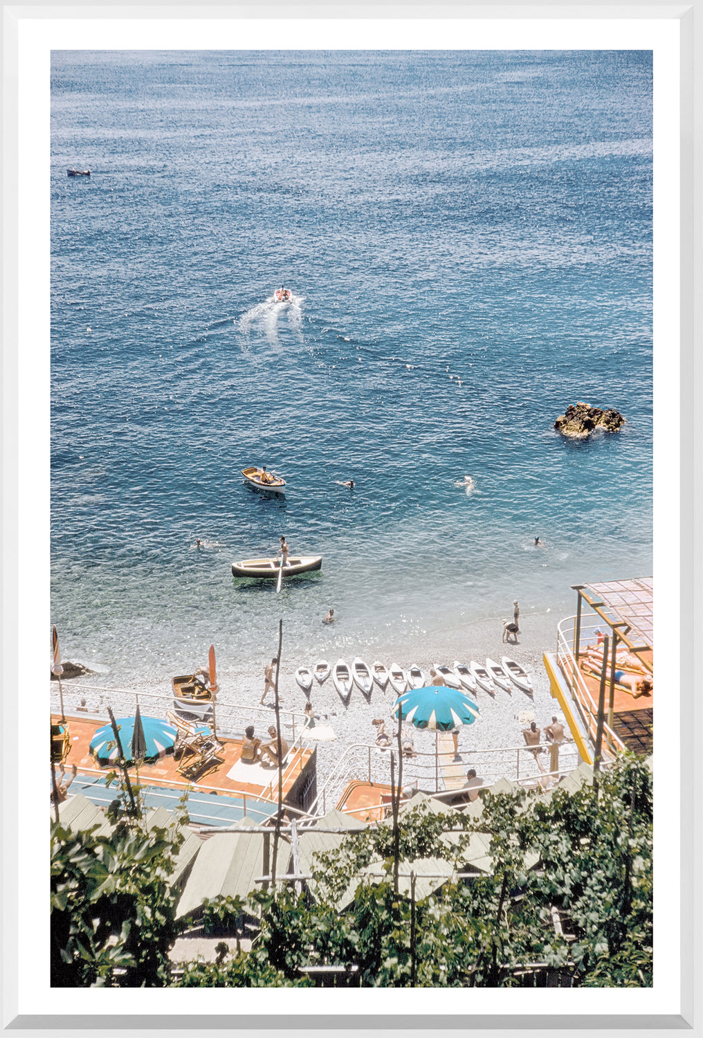 Toni Frissell – Capri II, C. 1959, aerial view of a beach with boats and sunbathers