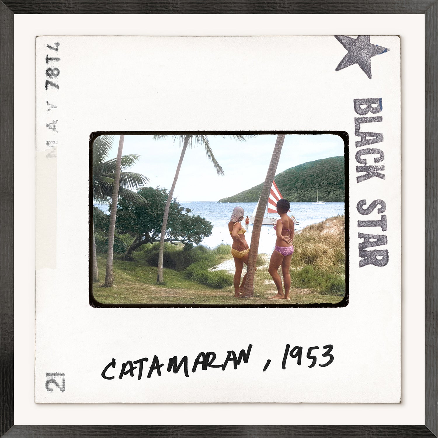 Toni Frissell Slides, Catamaran, 1953; vintage photo of two women in swimsuits by the beach, palm trees, and water.