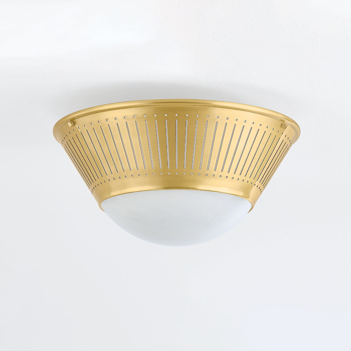 Elsmere Flush Mount in aged brass shown from a second angle to highlight the shade profile and mounting canopy.
