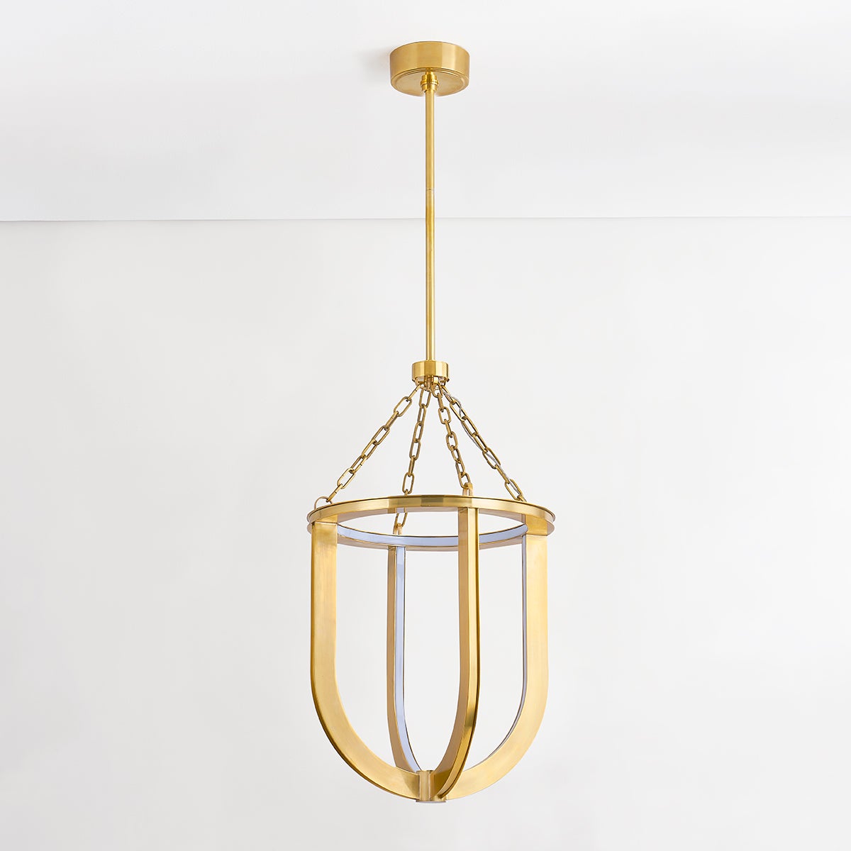 Tournu Lantern 16.25" in aged brass shown from a second angle to highlight the frame and glass panel detail.