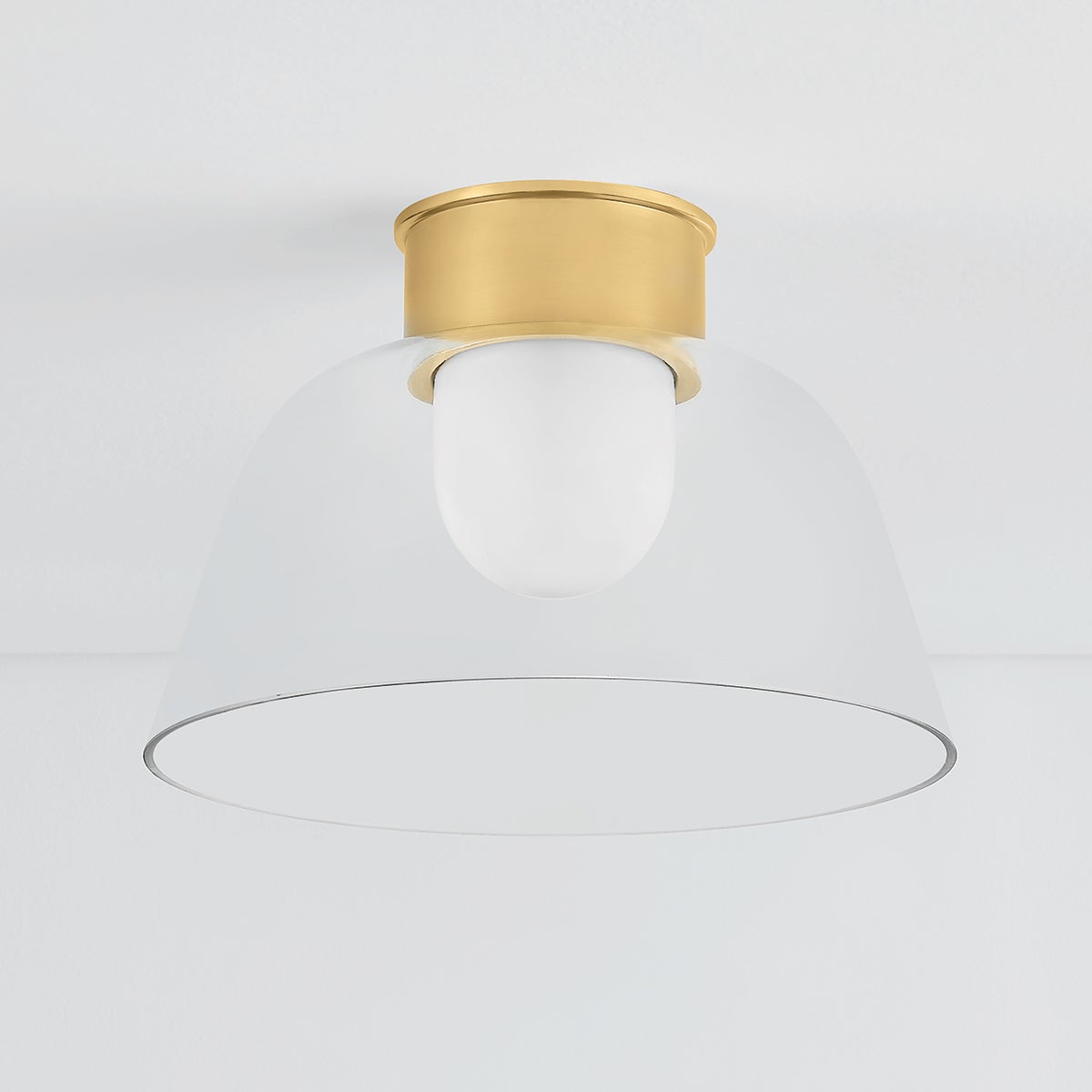 Lakeside Flush Mount 14" in aged brass shown from the front to reveal the shade profile and mounting canopy.