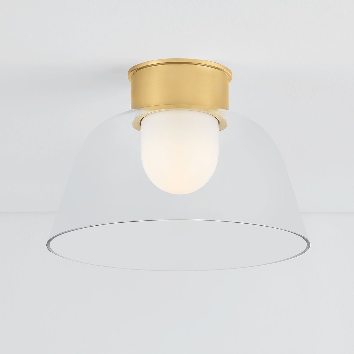 Close-up of the Lakeside Flush Mount 14" in aged brass showing the shade profile and mounting canopy.