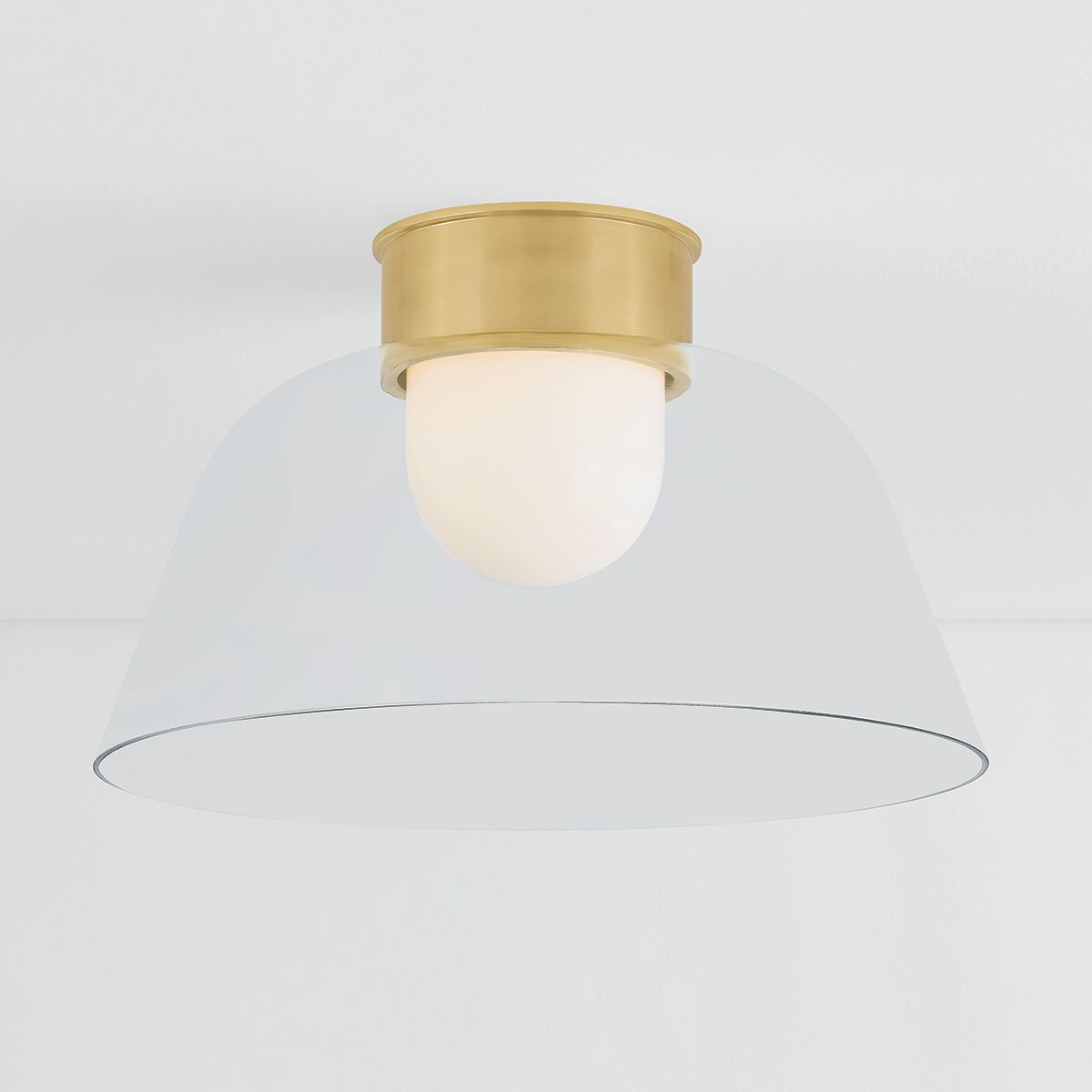Close-up of the Lakeside Flush Mount 20" in aged brass showing the shade profile and mounting canopy.