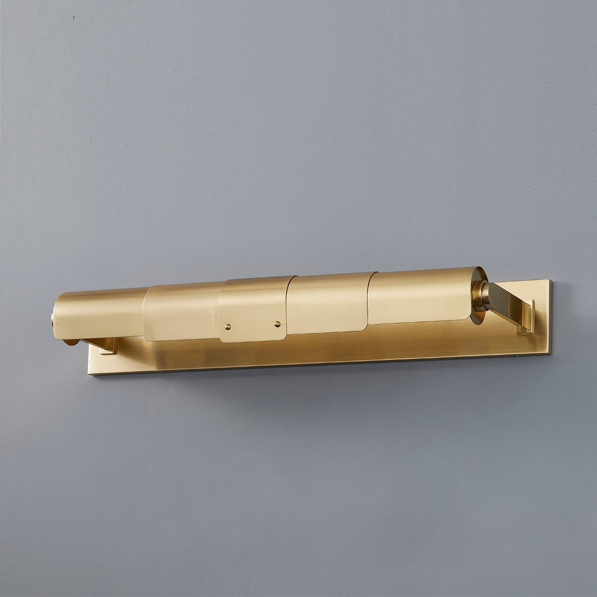 Oneonta Picture Light 24" in aged brass shown from the front to reveal the arm curve and shade proportion.