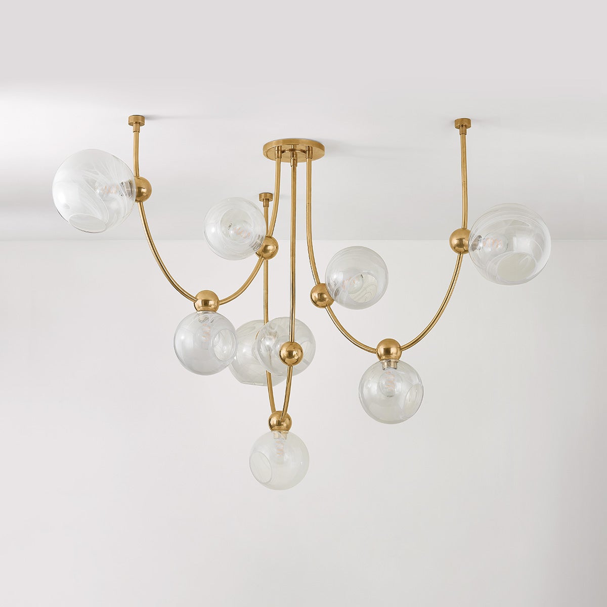 Astraia Chandelier shown from a second angle to highlight the frame, arms, and shade detail.
