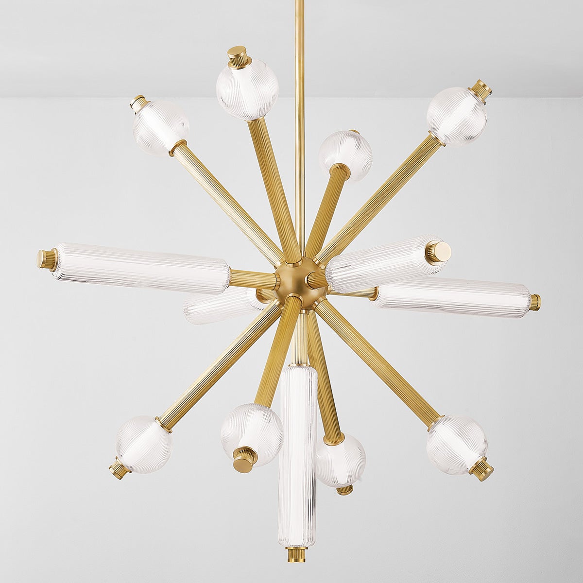 Close-up of the Atom Chandelier 50" showing the frame, arms, and shade detail.