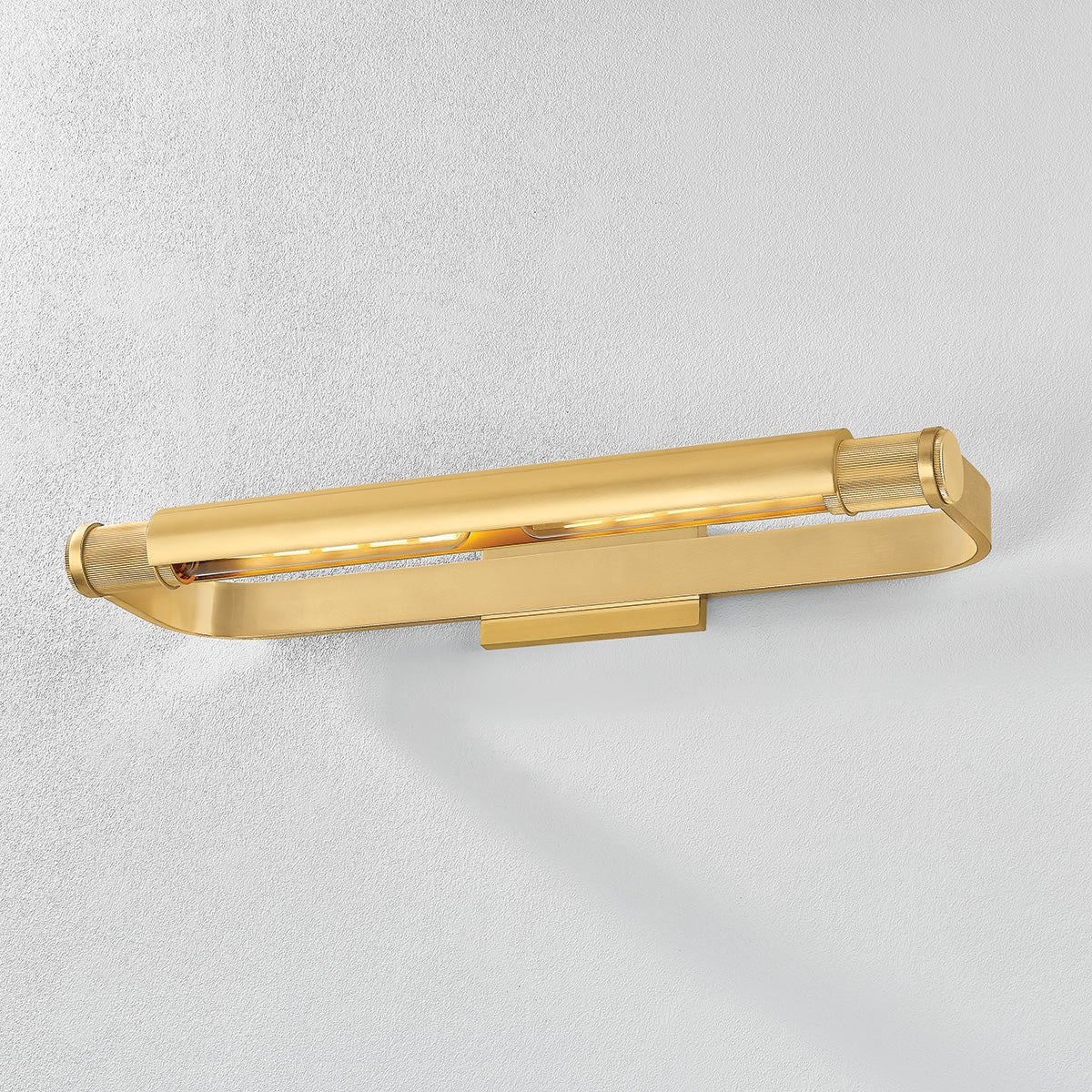 Close-up of the Elm Park Picture Light 24" in aged brass showing the arm curve and shade proportion.