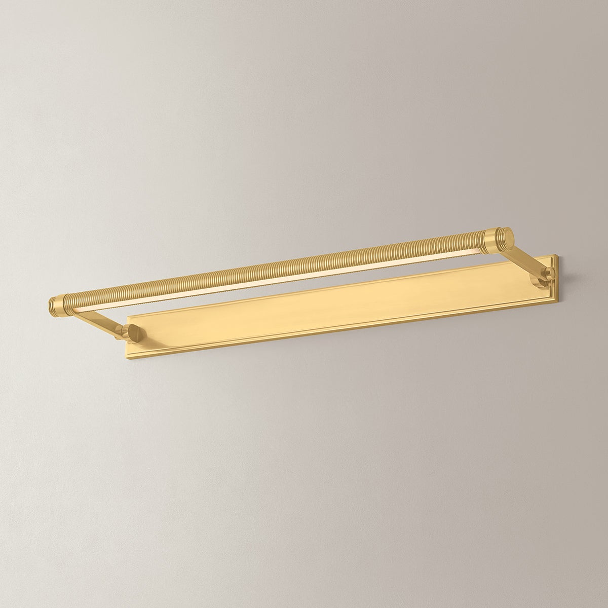 Close-up of the Duell Picture Light 30" in aged brass showing the arm curve and shade proportion.