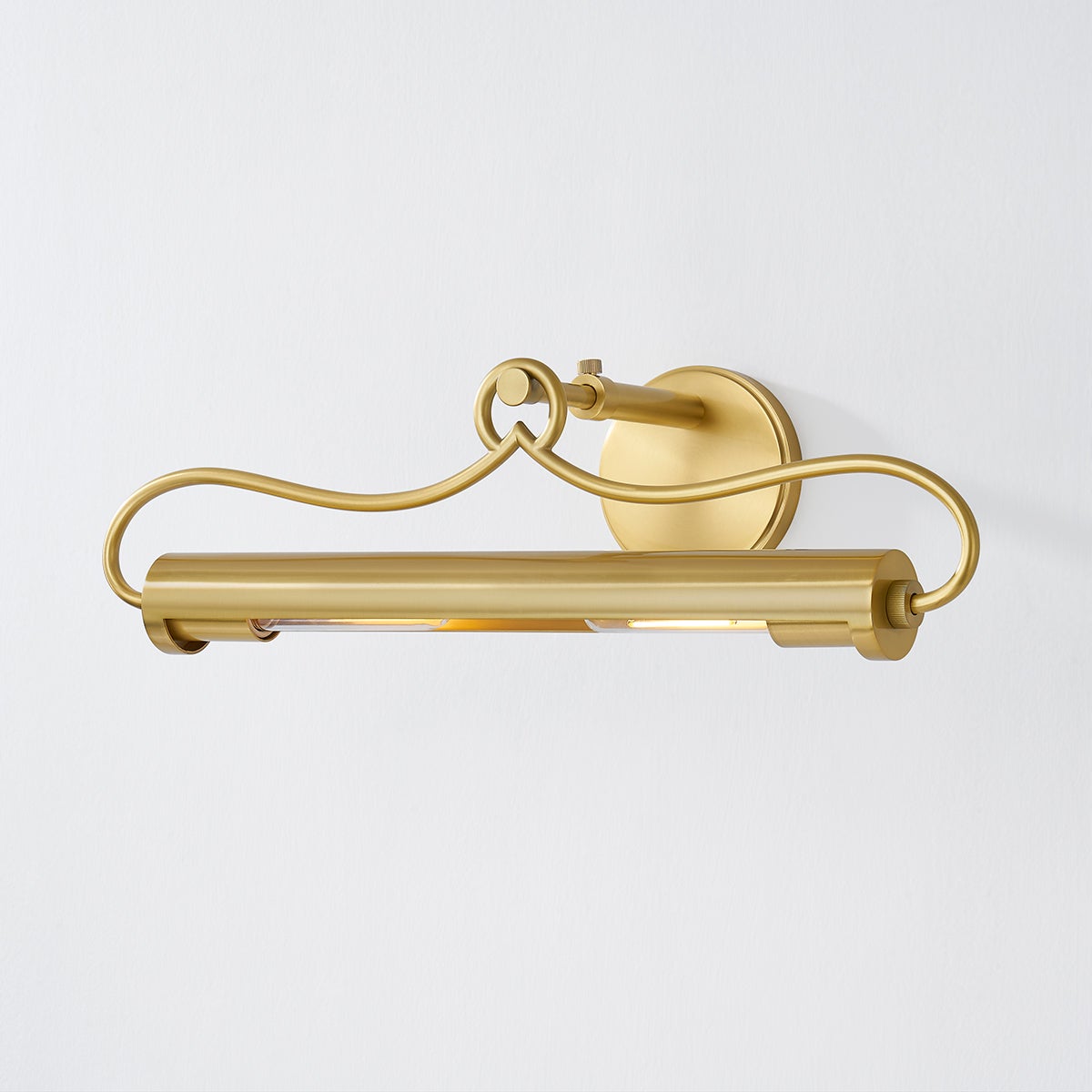 Close-up of the Berun Picture Light 20.5" in aged brass showing the arm curve and shade proportion.