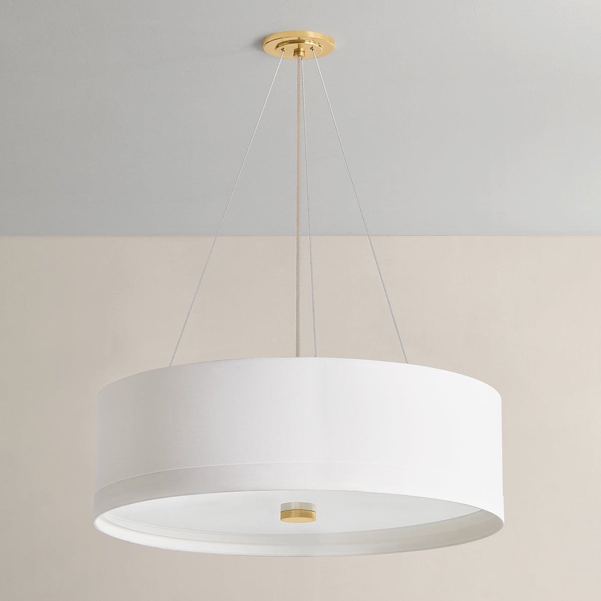 Ashland Pendant 32" in aged brass shown from the front to reveal the shade shape and metal detail.