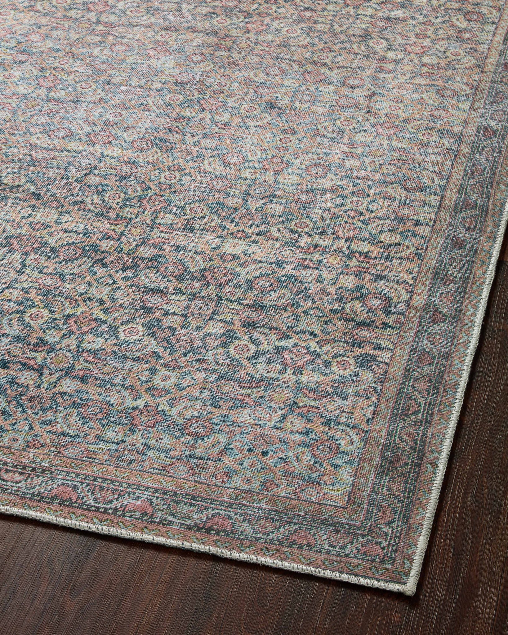 Adrian Denim / Multi styled underfoot in a layered living room at Laurie Yapp Home.