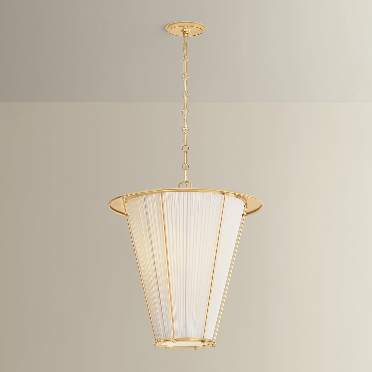 Close-up of the Ellsworth Lantern 22" in aged brass showing the frame and glass panel detail.
