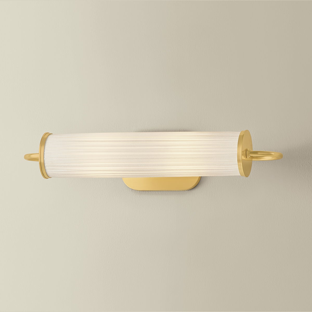 Close-up of the Elaine Picture Light in aged brass showing the arm curve and shade proportion.
