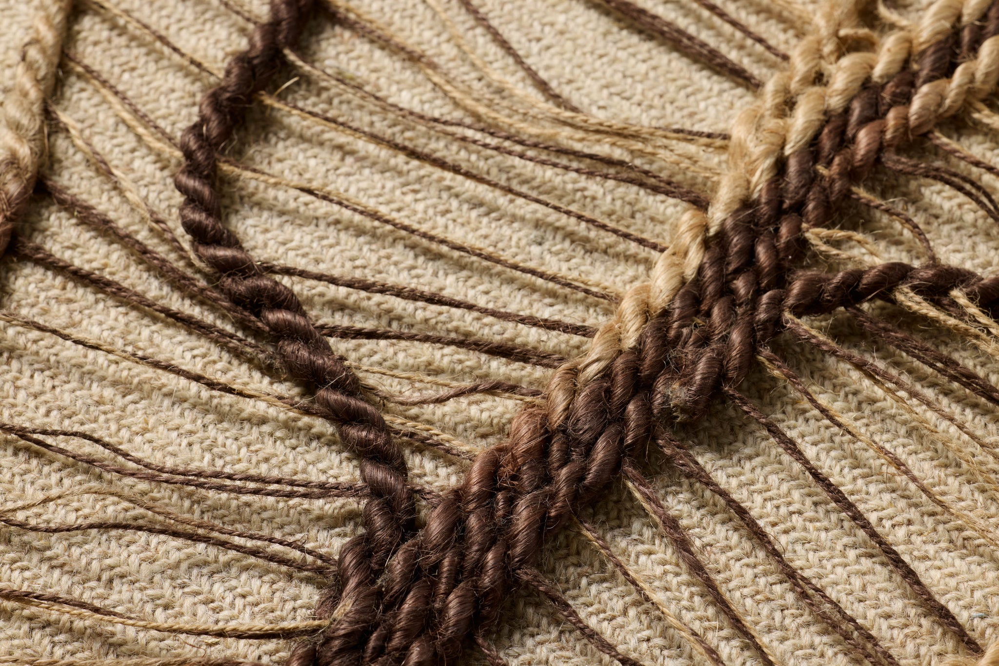 Autumn's Lace Dark Brown Rug Art shown from a different angle to reveal its pattern.