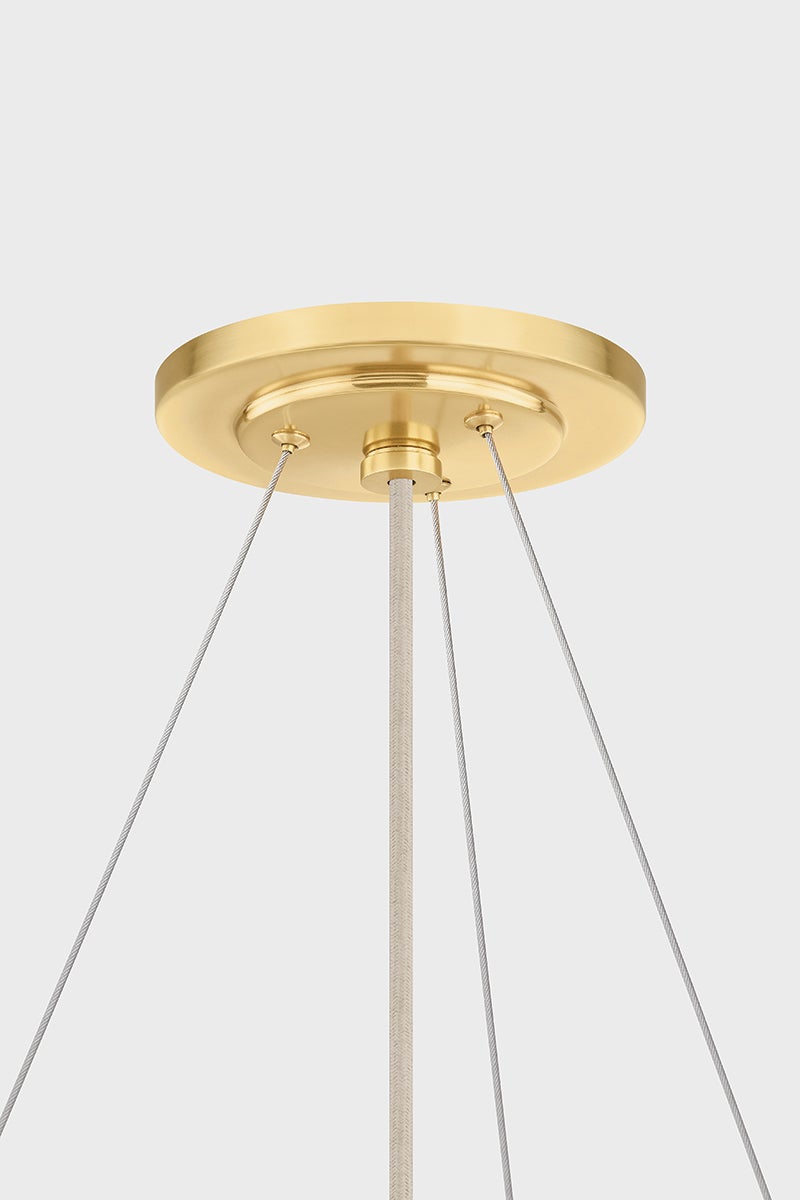 Ashland Pendant 32" in aged brass shown from a second angle to highlight the shade shape and metal detail.