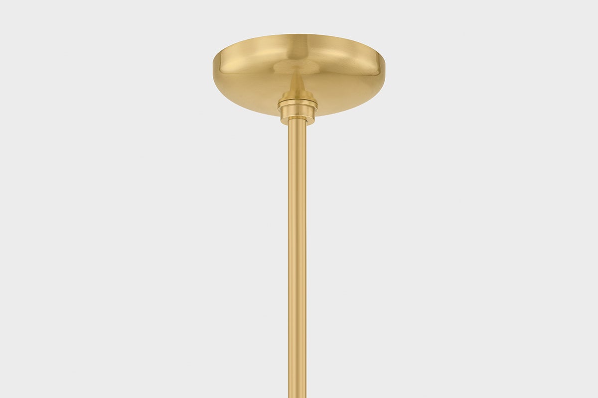 Auburndale Pendant in aged brass shown from the front to reveal the shade shape and metal detail.