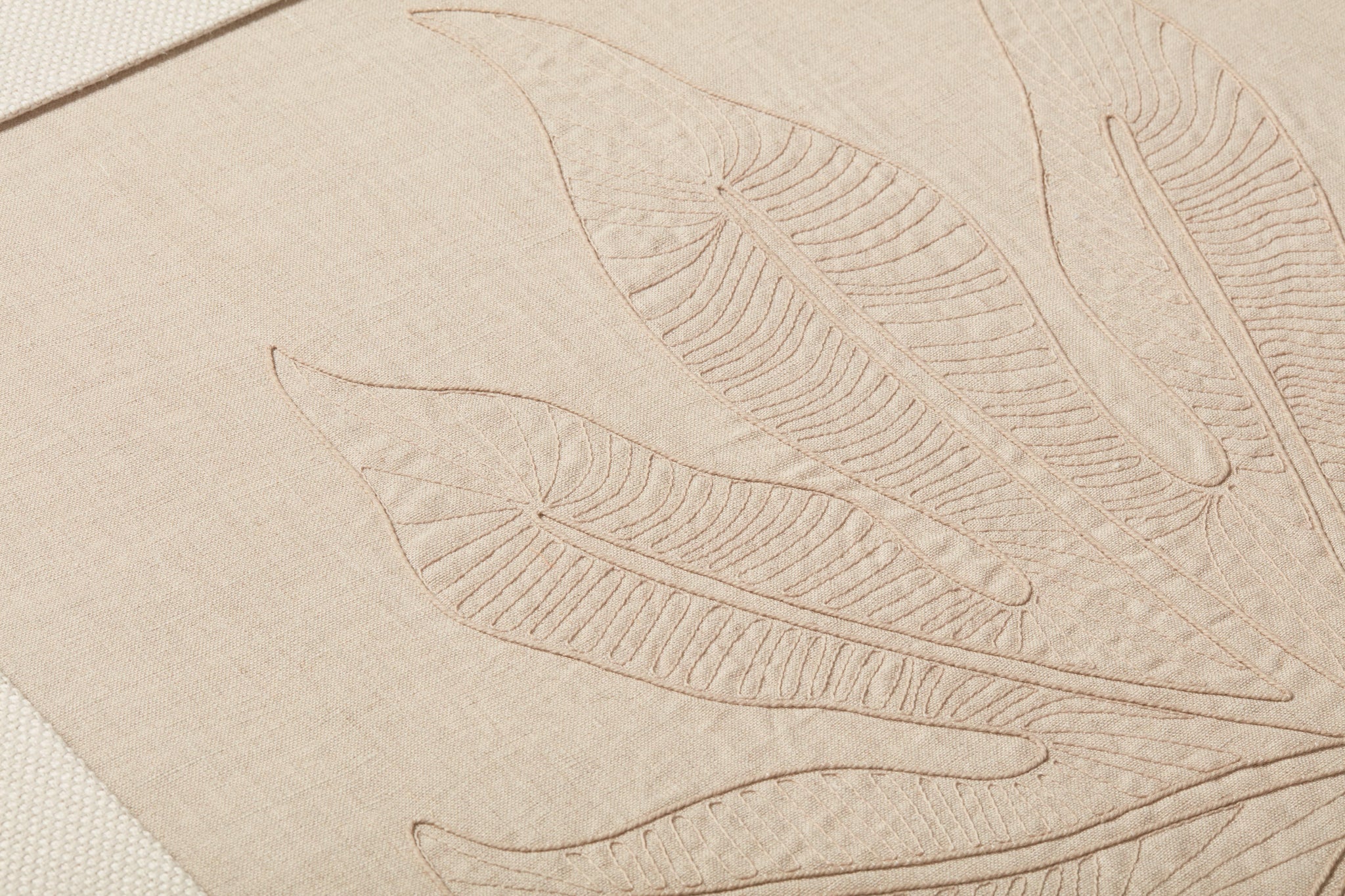 Schefflera Natural / Beige shown from a different angle to reveal its pattern.