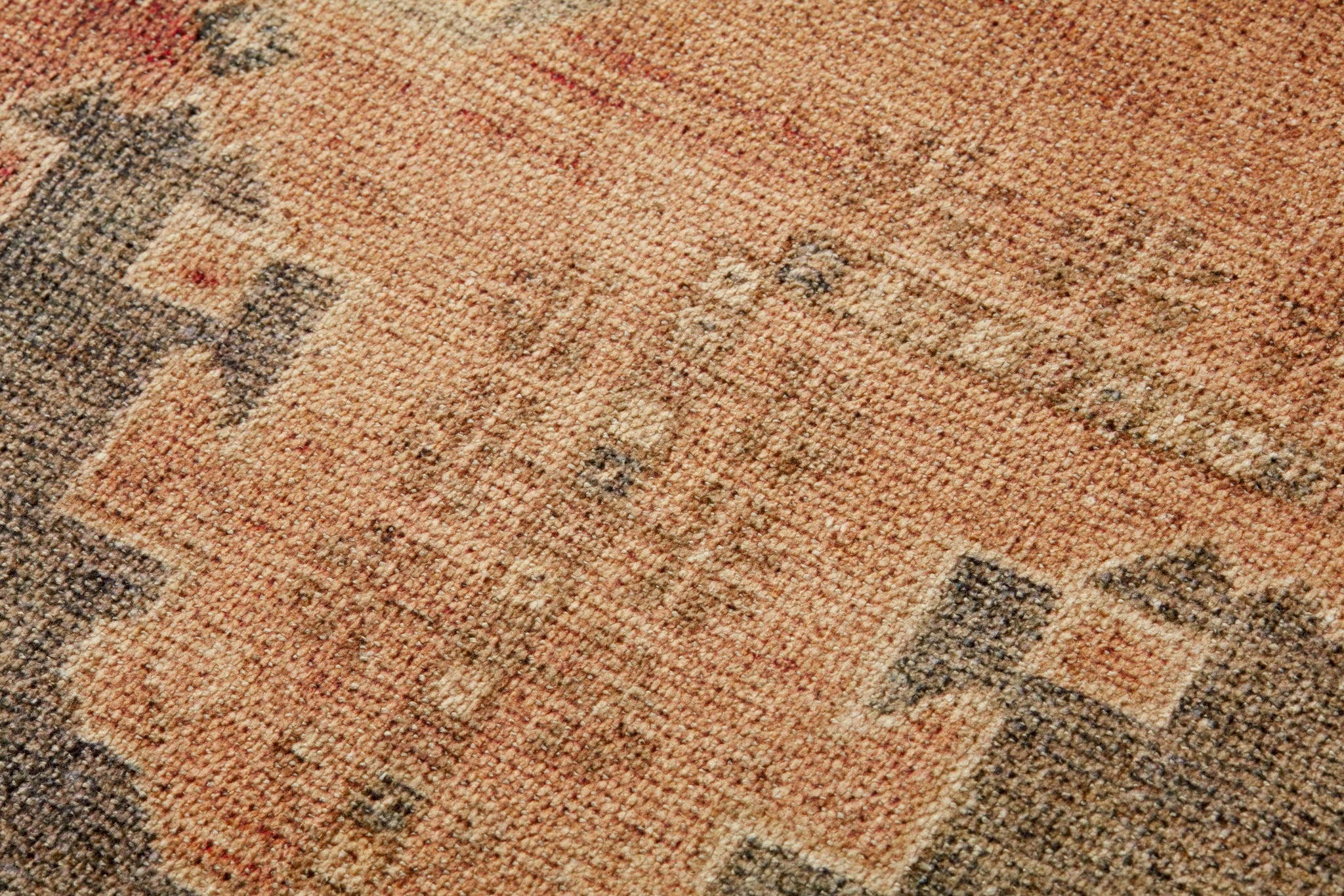 Genevive Brown / Rust Rug Art shown from a different angle to reveal its pattern.