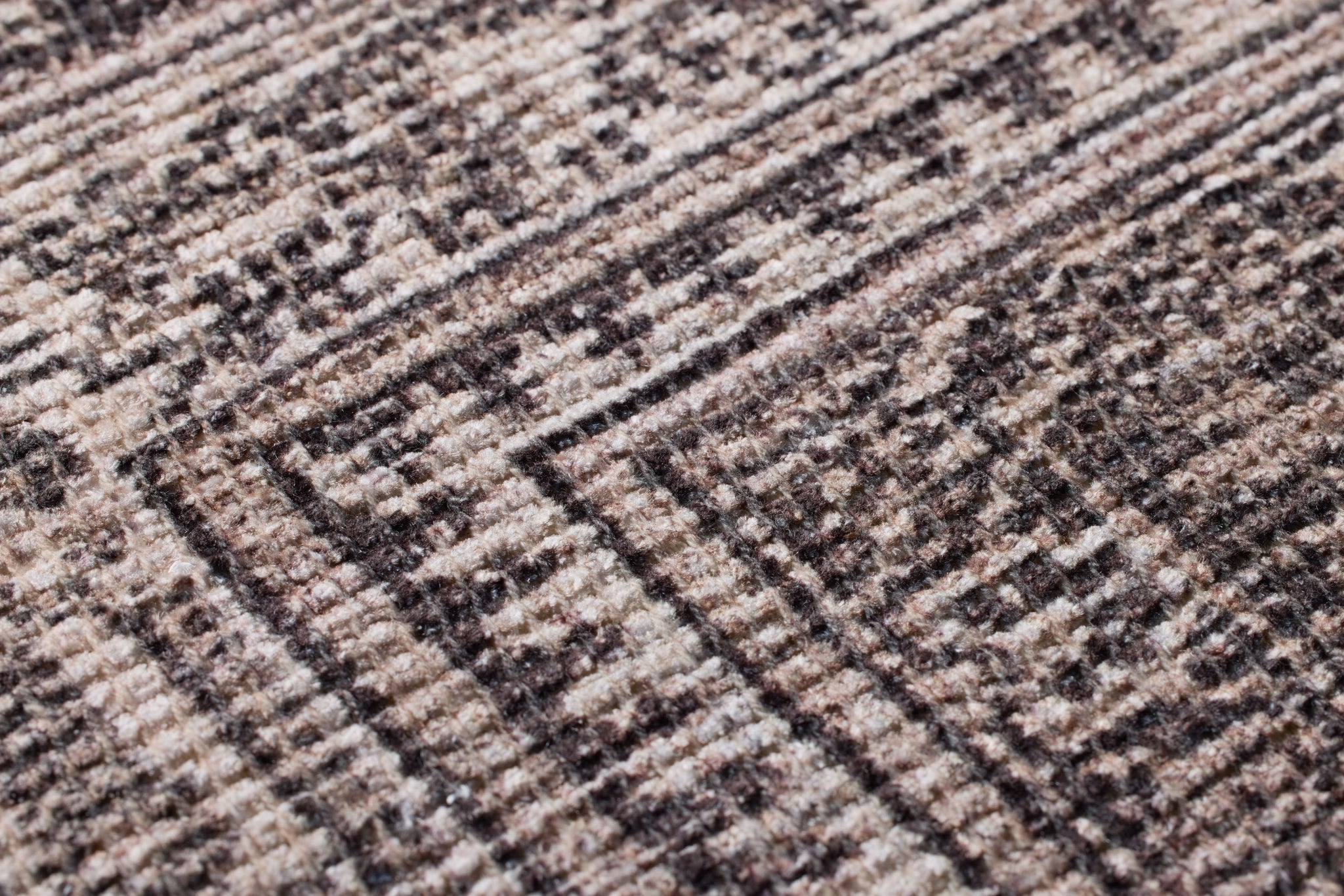 Cyrene Brown / Beige Rug Art shown from a different angle to reveal its pattern.