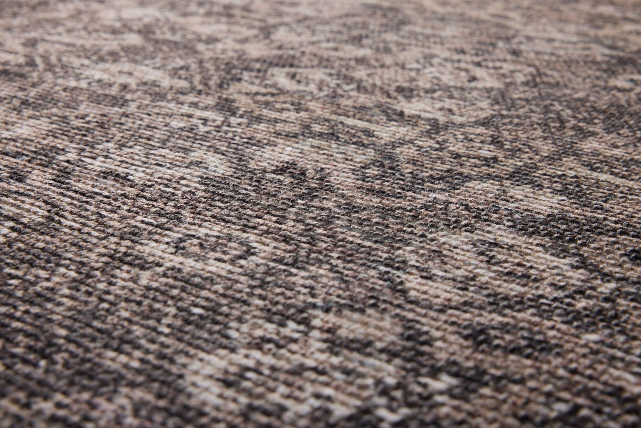 Persepolis Brown / Black Rug Art shown from a different angle to reveal its pattern.