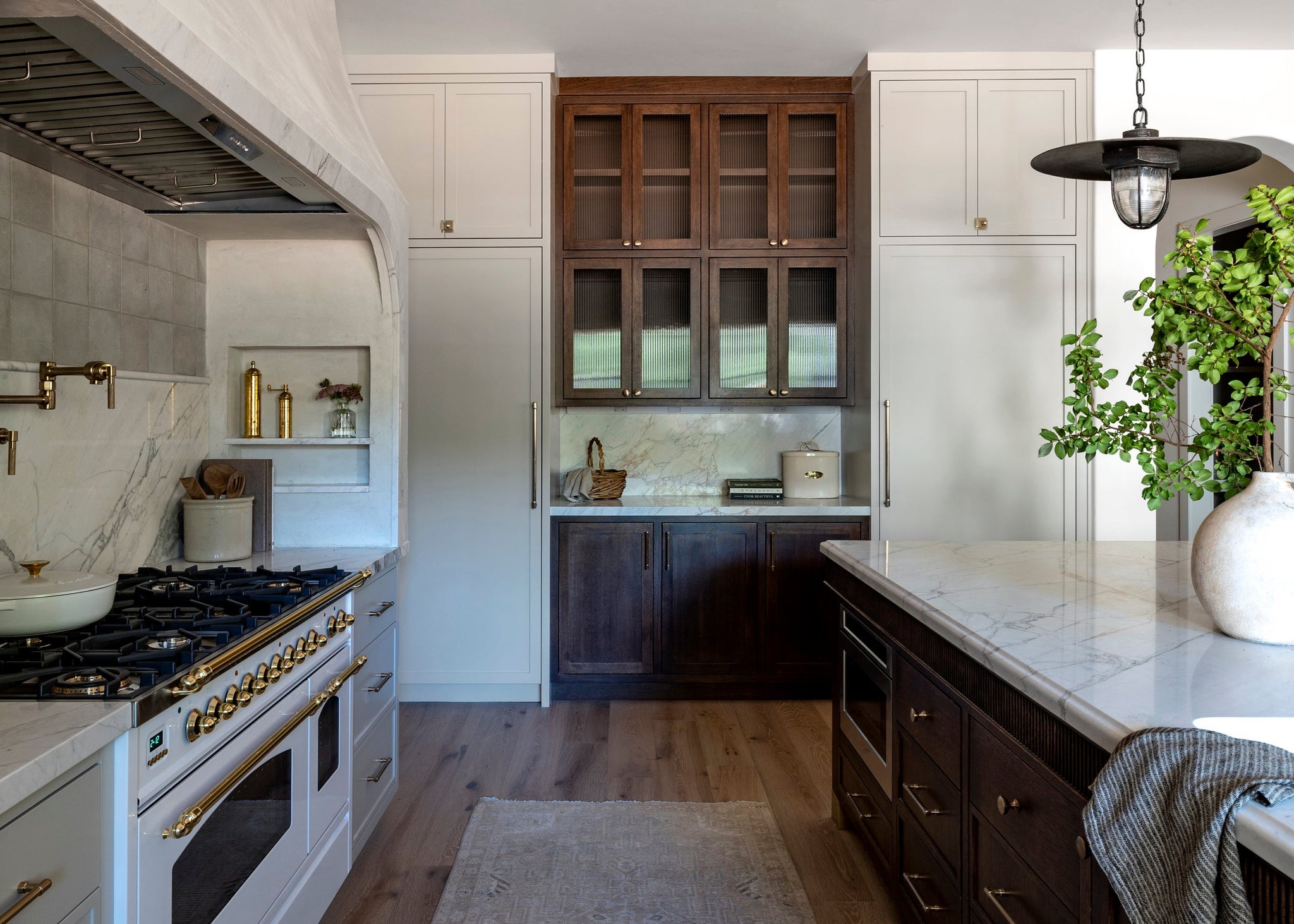 Acme Pendant 22" styled in a welcoming entryway for warm, layered light at Laurie Yapp Home.