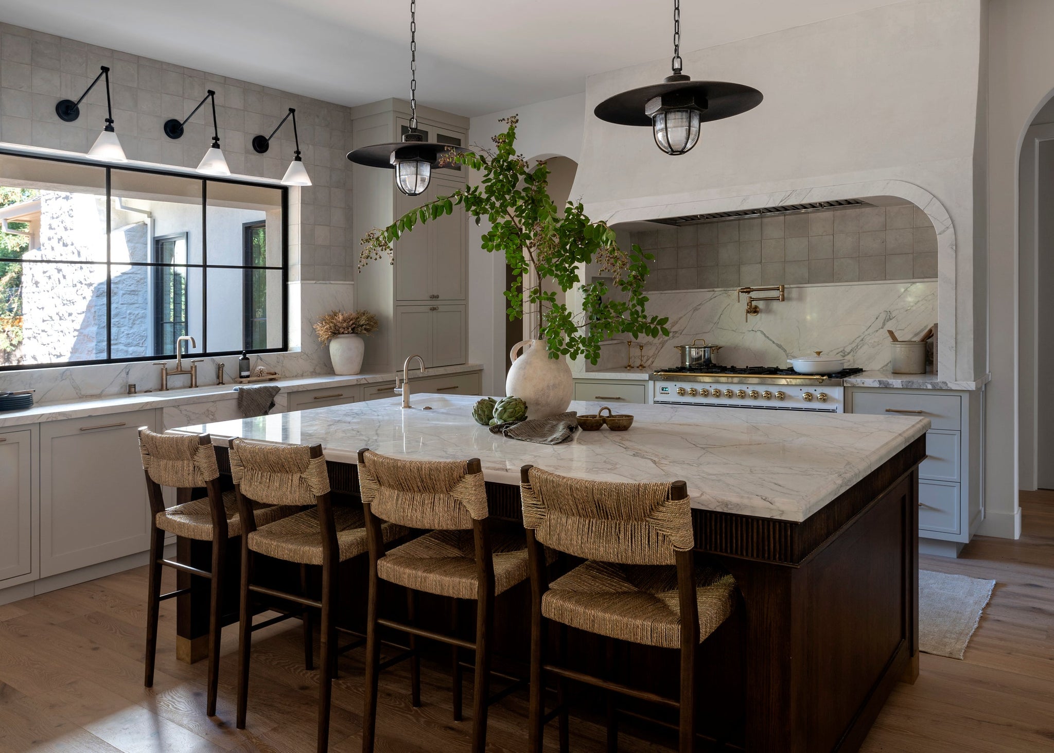 Acme Pendant 22" styled in a welcoming entryway for warm, layered light at Laurie Yapp Home.