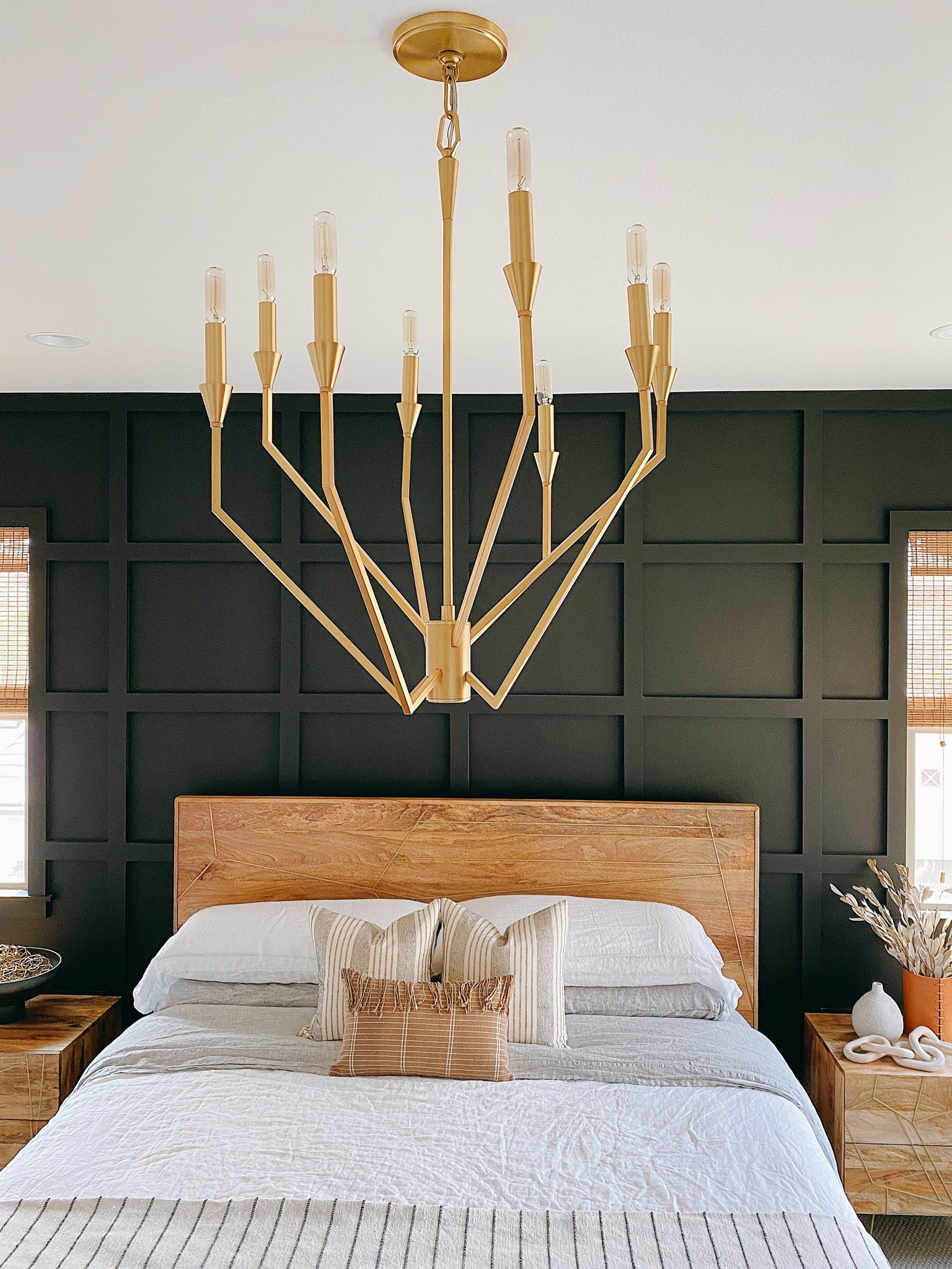 Archie Chandelier 25.25" in aged brass styled in an elegant dining room for warm, layered light at Laurie Yapp Home.