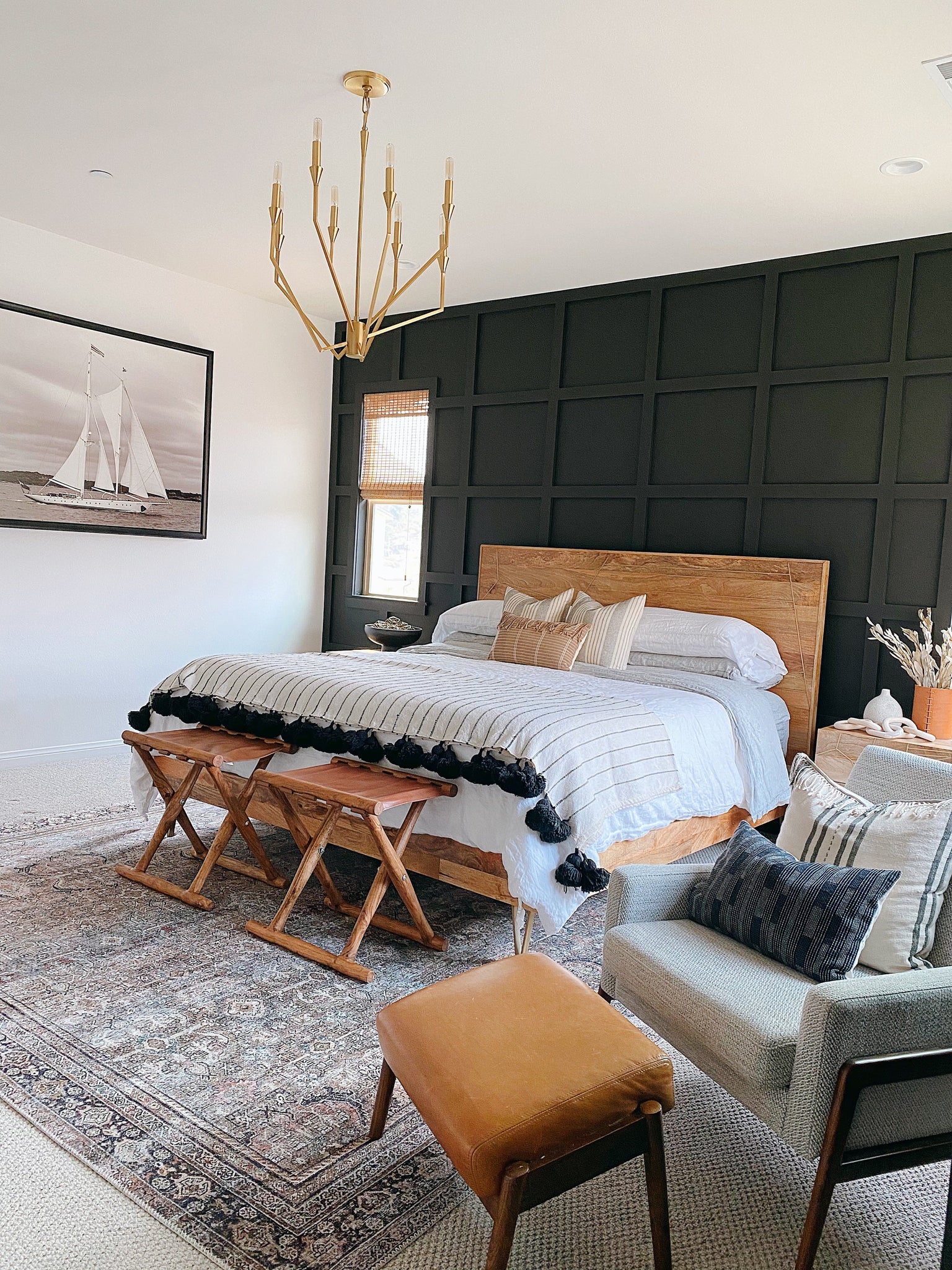 Archie Chandelier 25.25" in aged brass styled in an elegant dining room for warm, layered light at Laurie Yapp Home.
