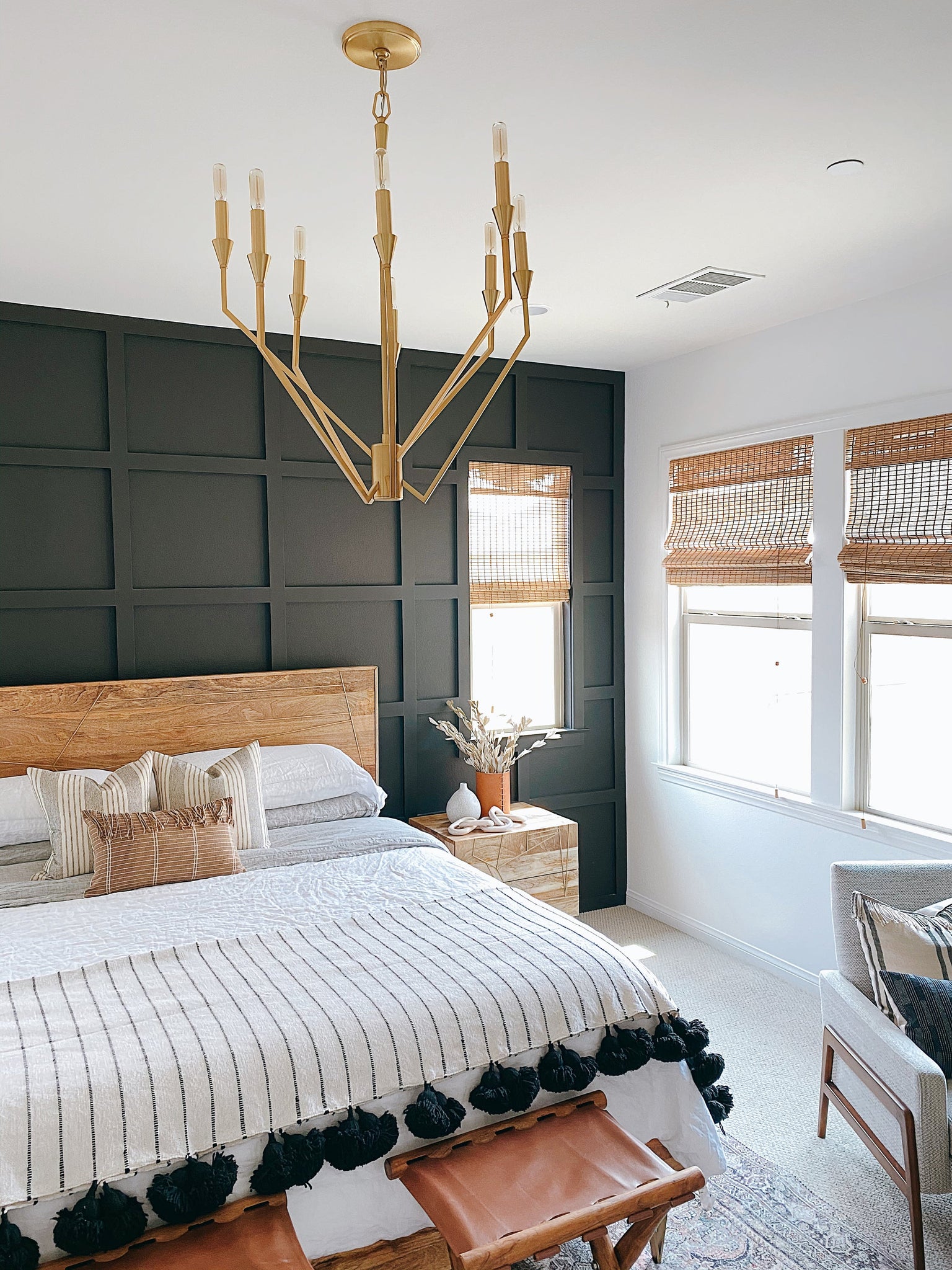 Archie Chandelier 25.25" in aged brass styled in a two-story entry for warm, layered light at Laurie Yapp Home.