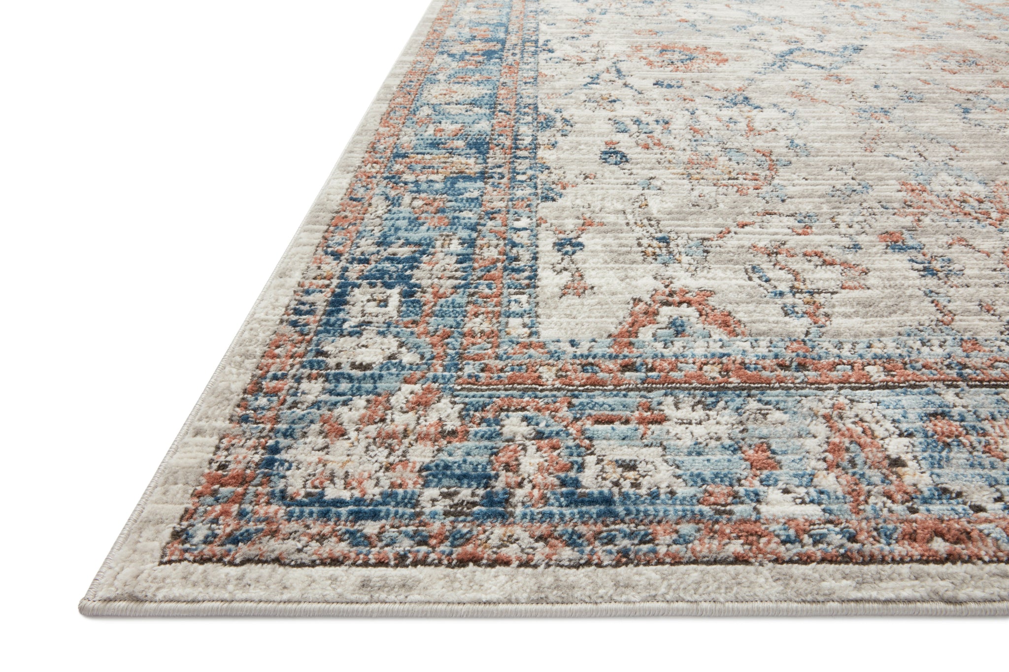 Side view of the Bianca Dove / Multi rug.