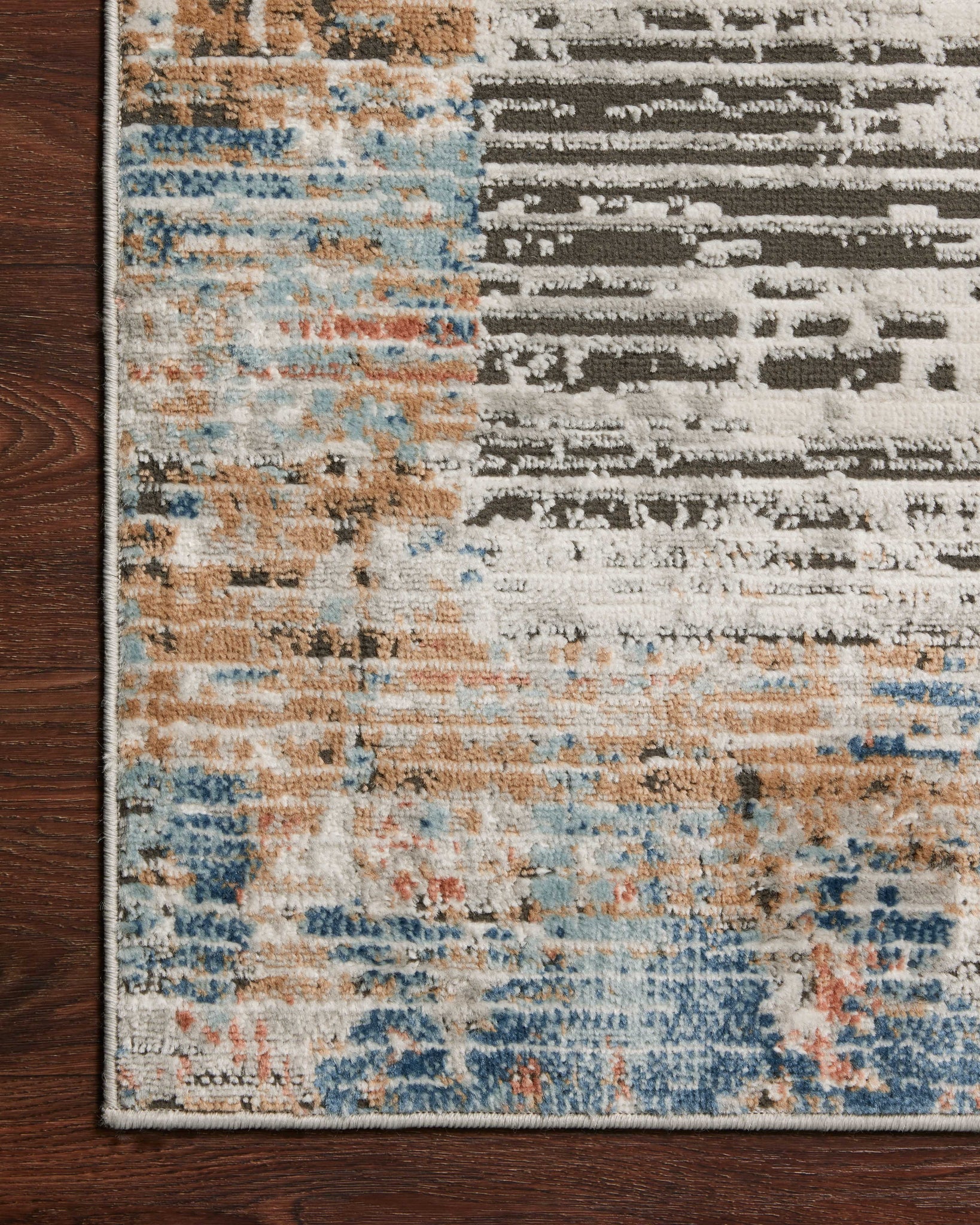 Close-up detail of the Bianca Ash / Multi showing its pile and weave.
