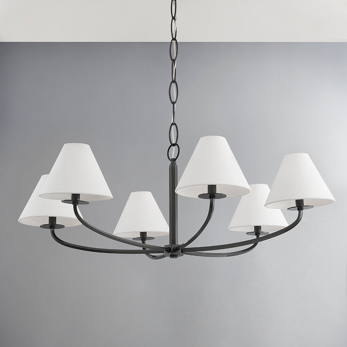 Close-up of the Stacey Chandelier 40.25" in bronze showing the frame, arms, and shade detail.