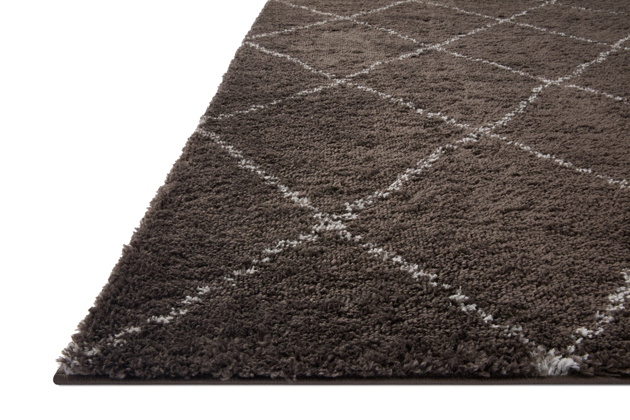 Side view of the Bliss Shag Bark / Grey rug.