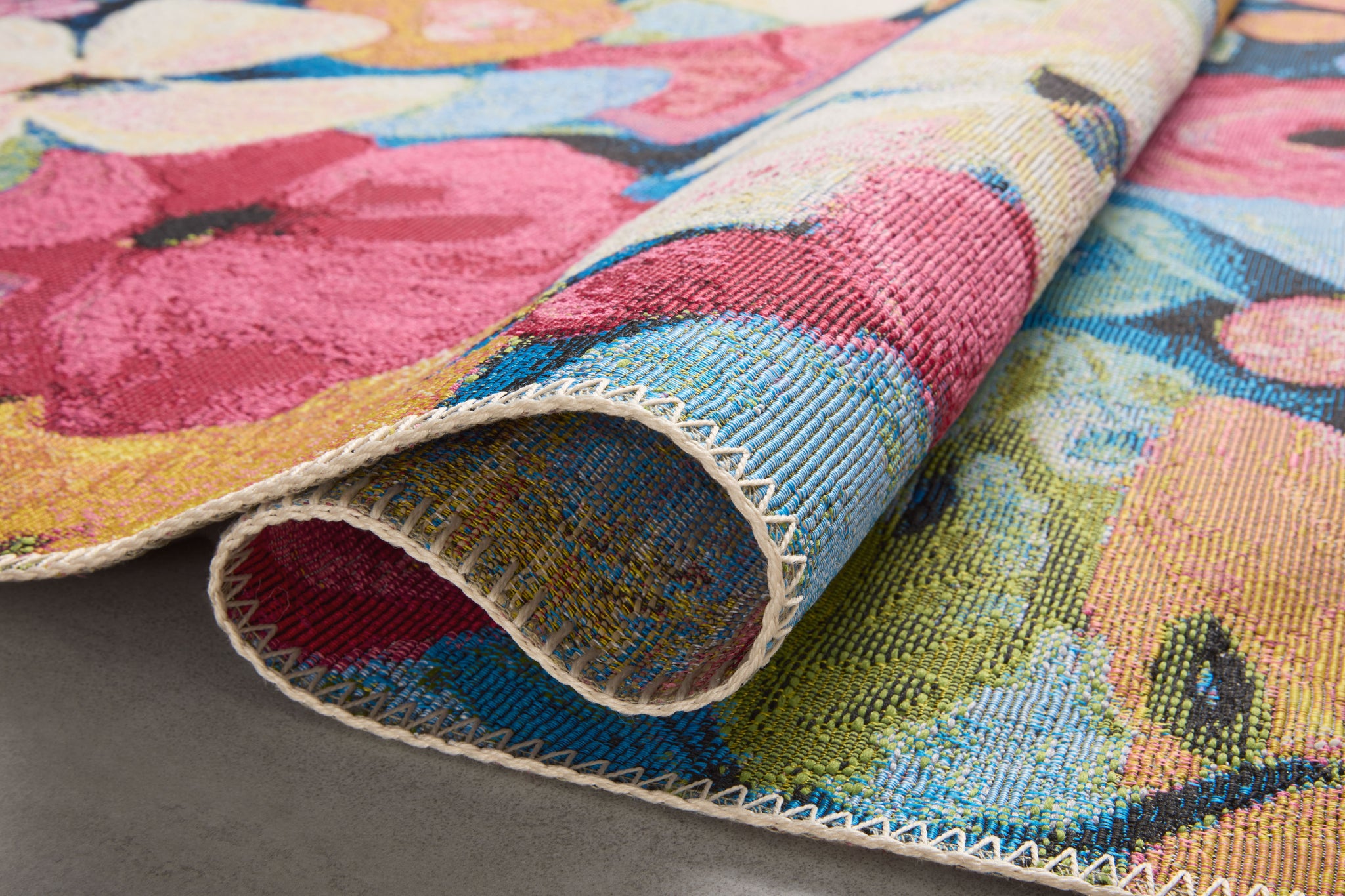 Close-up detail of the Botanical Navy / Multi showing its pile and weave.