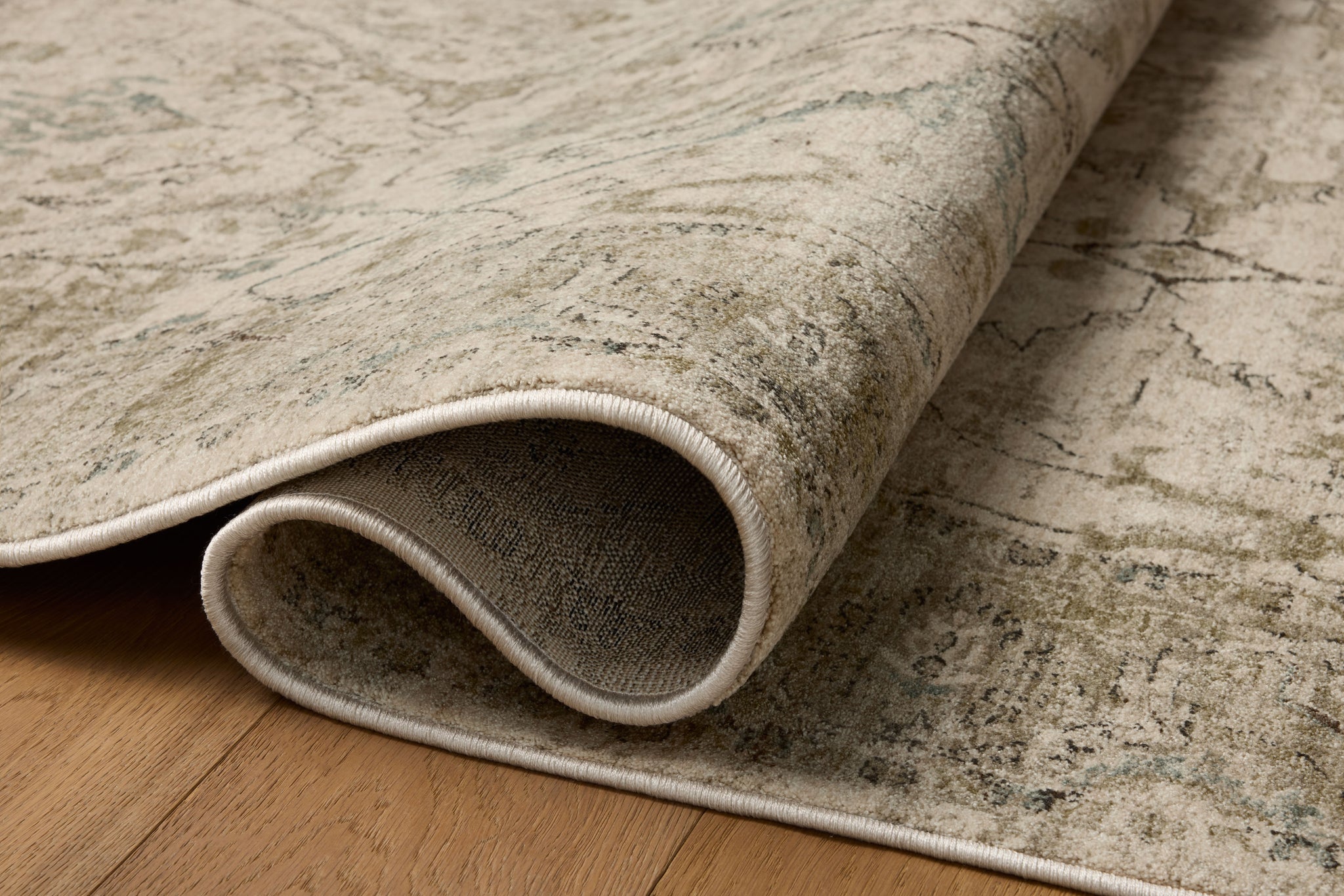 Briar Ivory / Sage shown from a different angle to reveal its pattern.