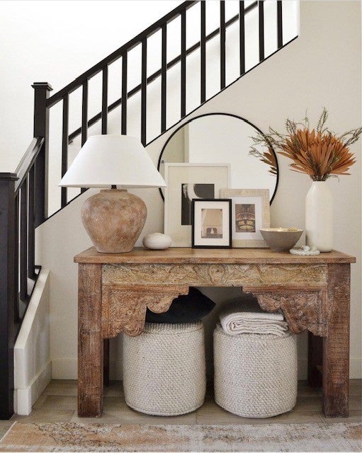 Calabria Table Lamp 22" styled in a bedroom nightstand for warm, layered light at Laurie Yapp Home.