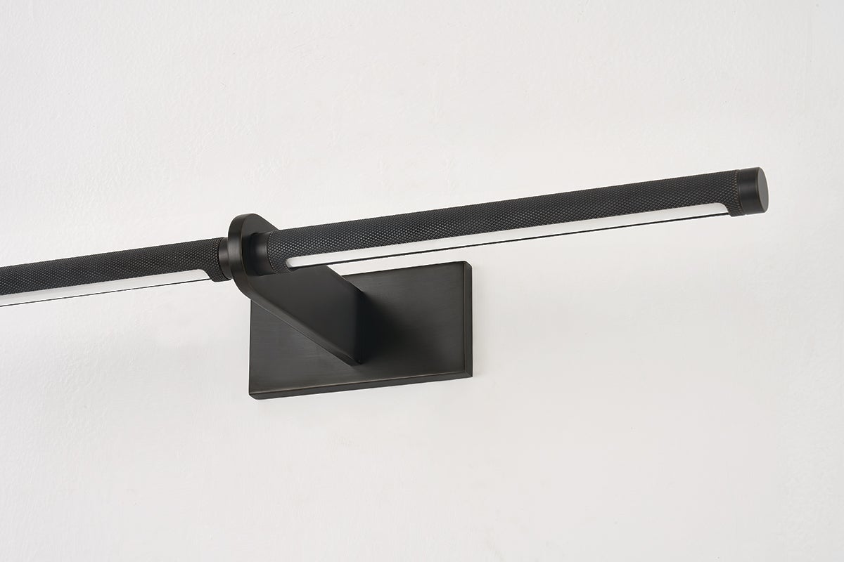 Close-up of the Deptford Picture Light 24" in dark bronze showing the arm curve and shade proportion.