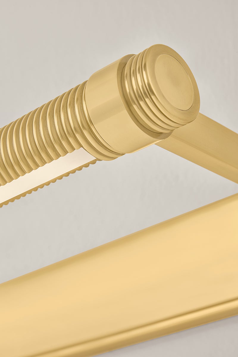 Close-up of the Duell Picture Light 30" in aged brass showing the arm curve and shade proportion.