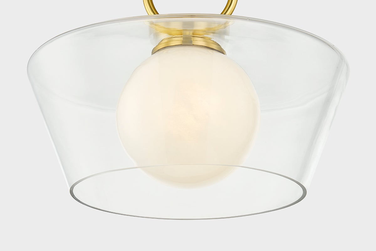 Elmsford Semi Flush in aged brass shown from the front to reveal the shade profile and mounting canopy.