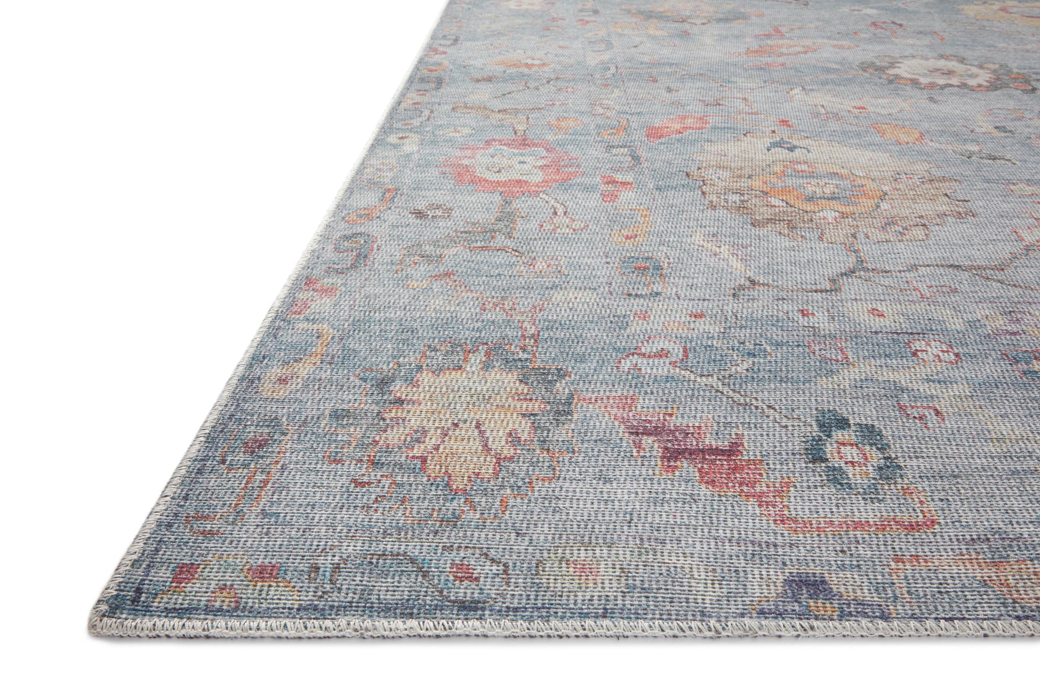 Side view of the Elysium Denim / Multi rug.