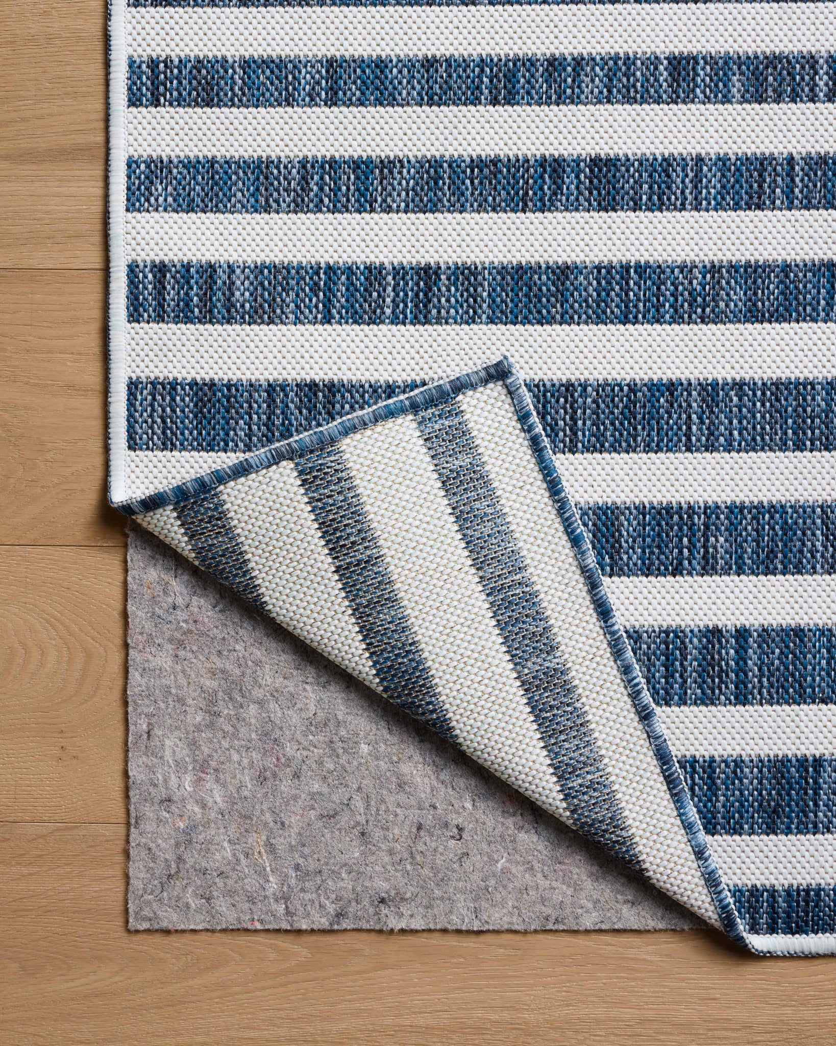 Easton Denim / Ivory shown from a different angle to reveal its pattern.