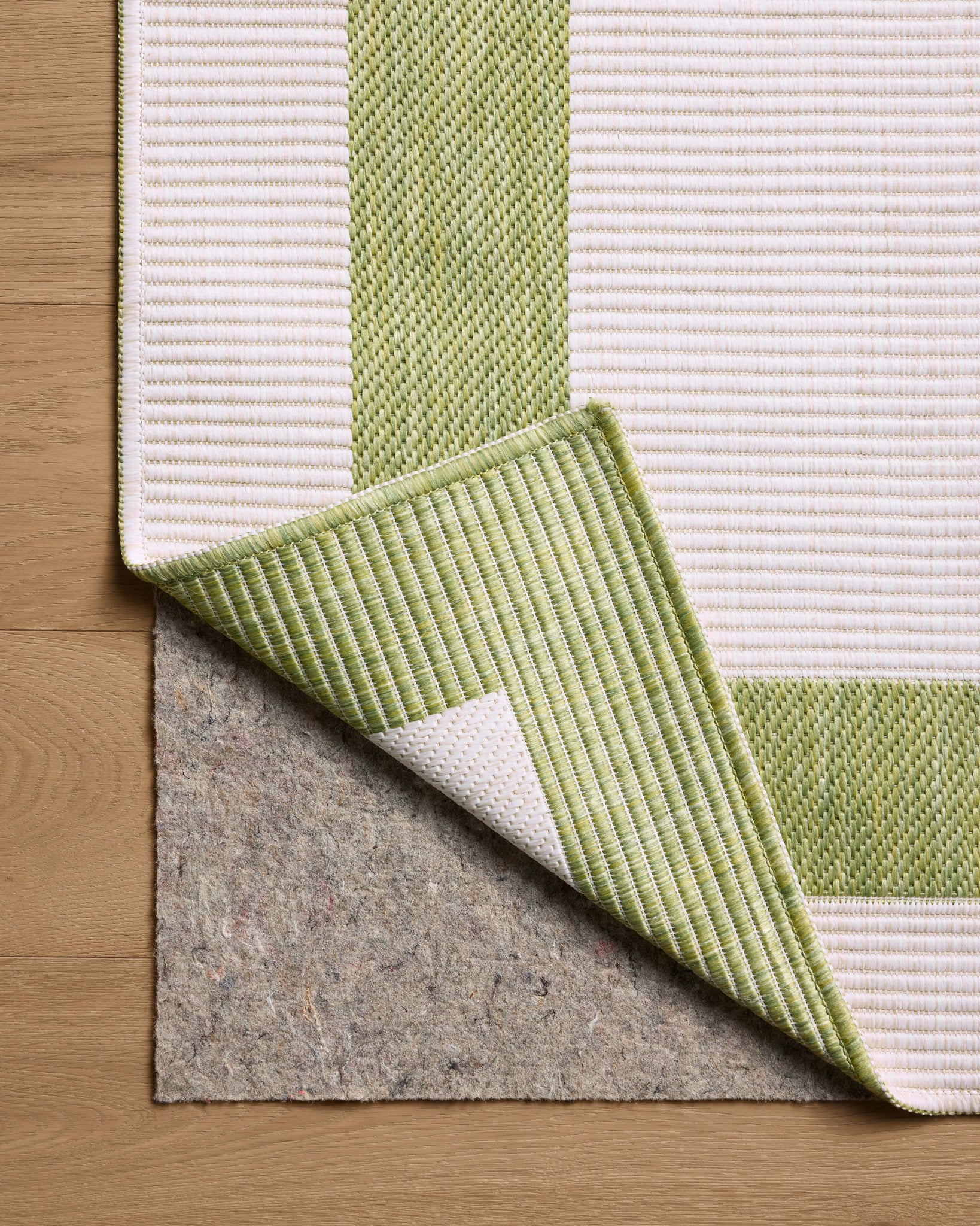 Easton Green / Ivory shown from a different angle to reveal its pattern.