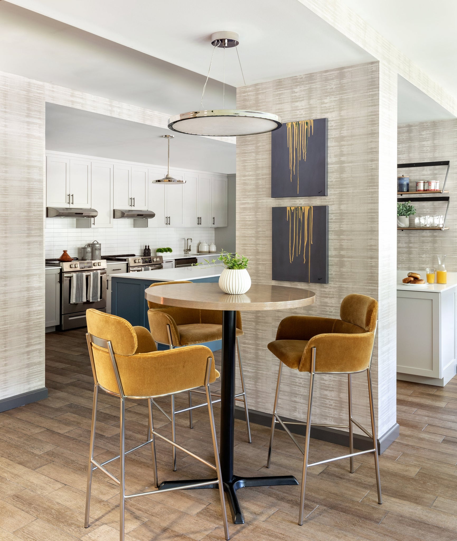 Eastport Chandelier 24.25" in polished nickel styled in a formal living room for warm, layered light at Laurie Yapp Home.
